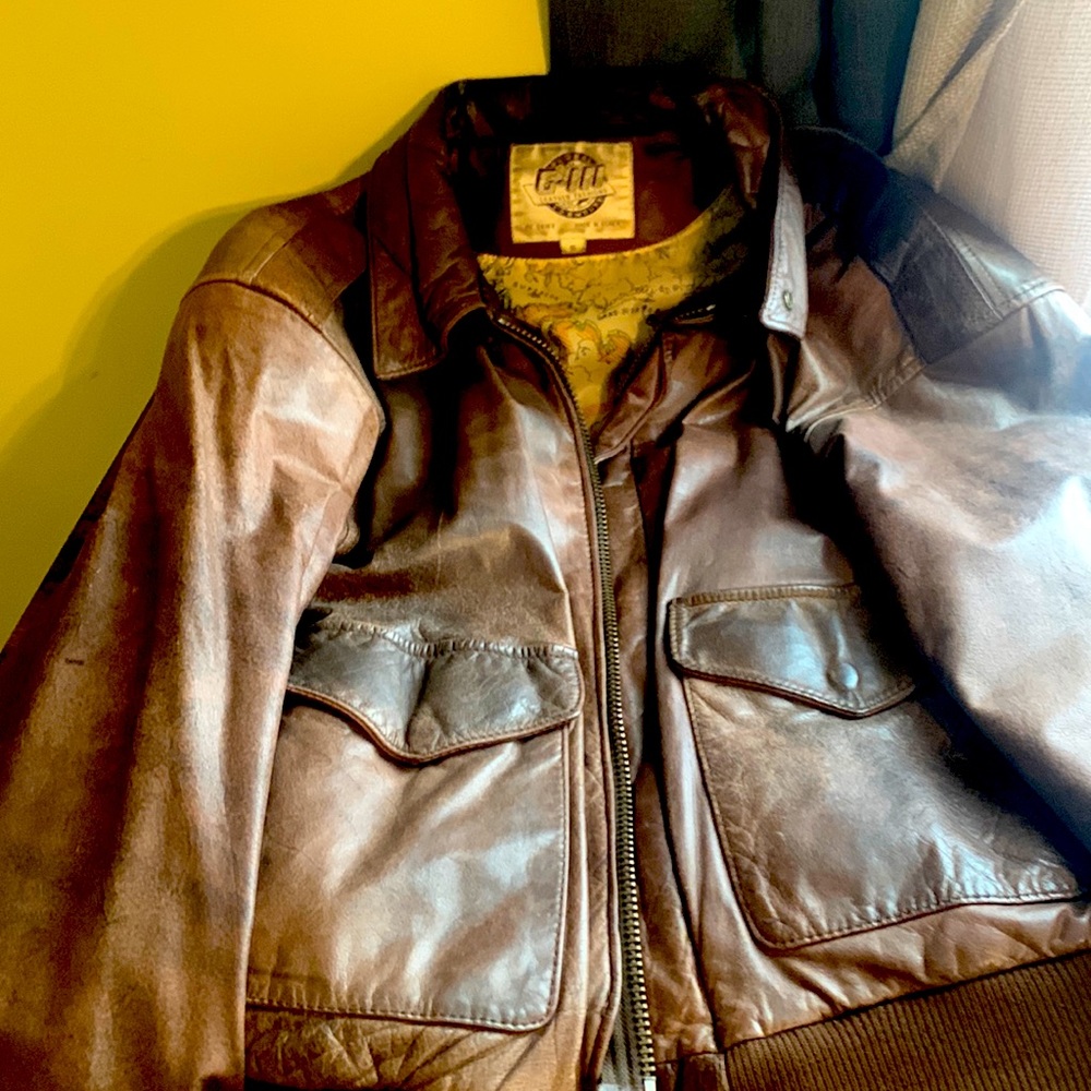 Leather Jacket, small but wears like a medium.Jacket looks great, 20 years old.